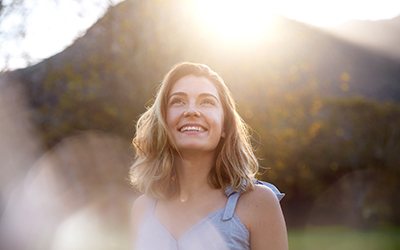 Woman smiling outside