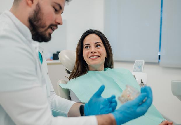Woman smiling in the dental chair