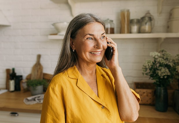 Woman smiling on the phone