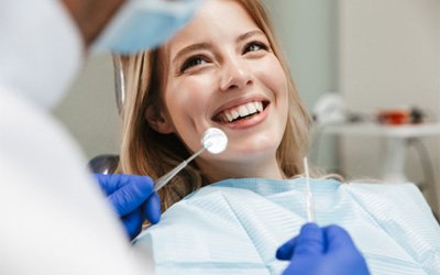 A young woman undergoing a dental checkup   