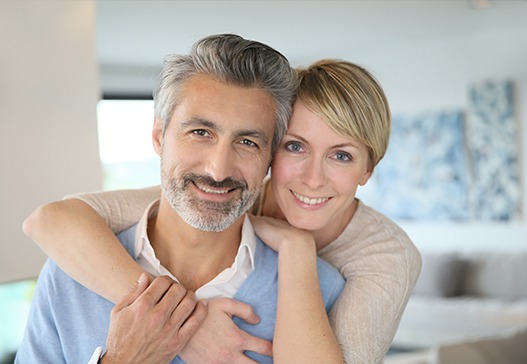 Man and woman well rested thanks to oral appliance therapy for sleep apnea