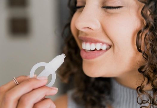 Patient smiling after zoom teeth whitening