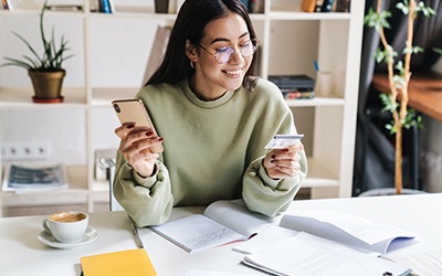 Woman using a credit card