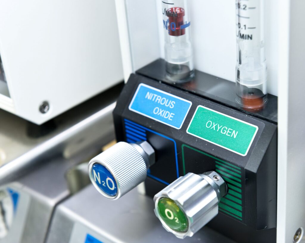 Nitrous oxide and oxygen dials on sedation machine